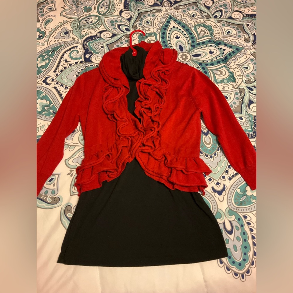 2 shirts both are a Small the black one is a turtleneck T-shirt